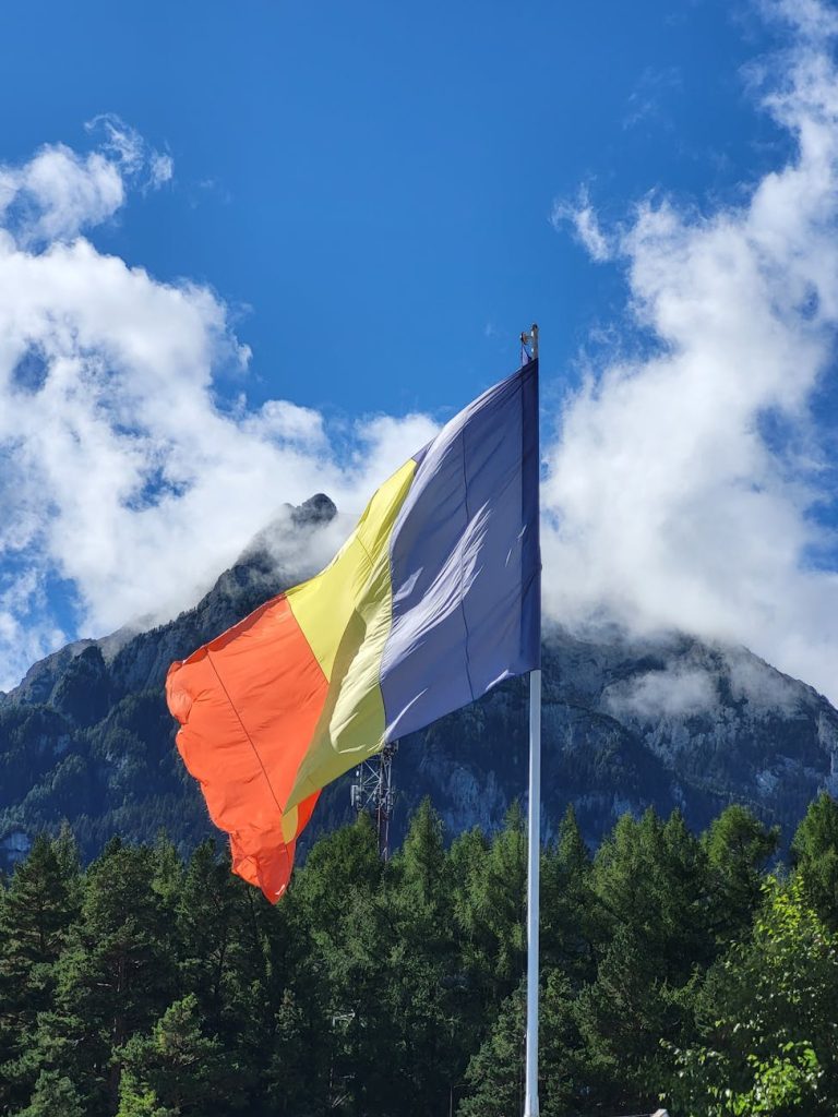 flag and mountains behind